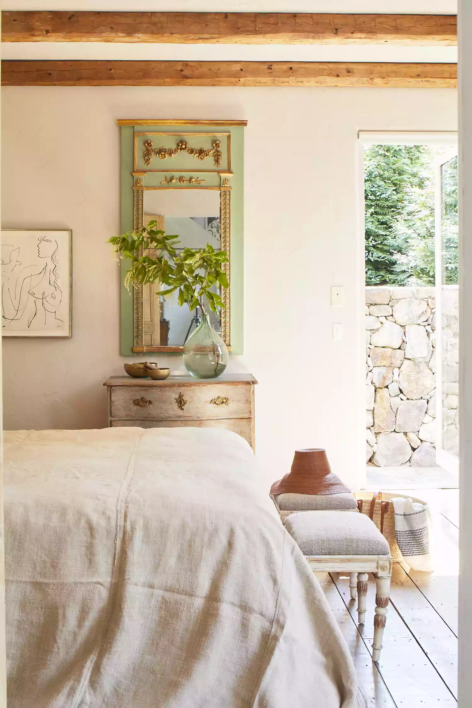 rustic bedroom with antique mirrror